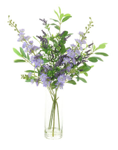 Lavender And Stock Floral Arrangement In Tall Glass Vase